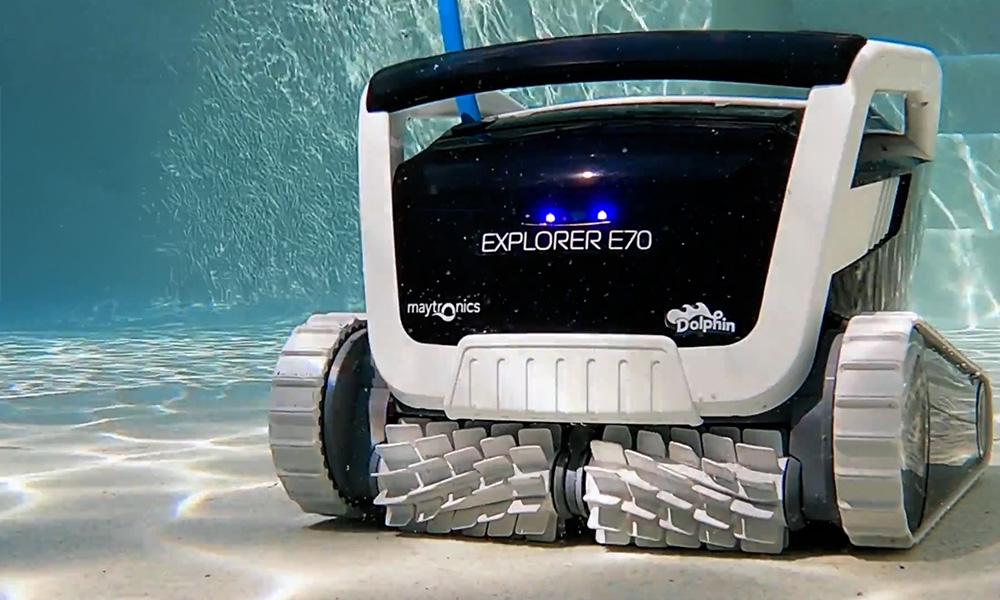 Dolphin Explorer E70 Robotic Pool Cleaner Vacuuming the Pool